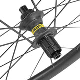Mavic Cosmic Ultimate Centre Lock disc wheelset with carbon rims for road cycling, featuring aerodynamic design and sleek black finish.