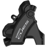 Shimano CUES BR-U6030 rear flat mount brake caliper in black, shown without rotor adapter, for bicycle braking systems.
