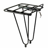 Minoura Gamoh Porteur front bike rack mounted on an urban bicycle, showcasing its stylish and functional design for urban cycling accessories.