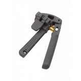Jagwire Pro Needle Driver tool in black for precise 5.0 and 5.5mm hydraulic hose fittings, shown in a workshop setting.