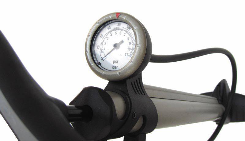 Passport Steel Track Floor Pump with reversible Schrader and Presta valve head, showcasing durable construction and ergonomic handle.
