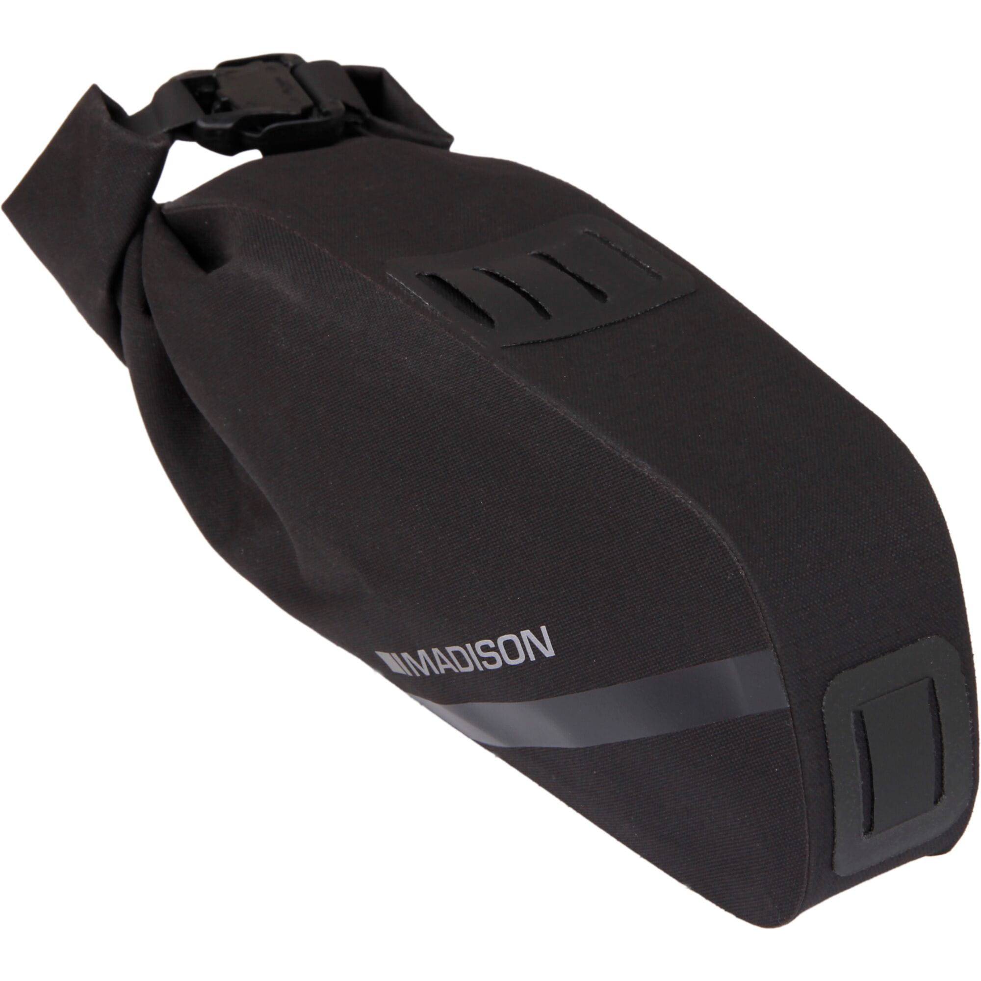 Madison Bags Roam waterproof saddle bag with elastic strap mounting system, designed for bike accessories and outdoor cycling.