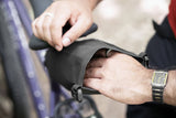Madison Bags Roam waterproof saddle bag with elastic strap mounting system, designed for cycling accessories.