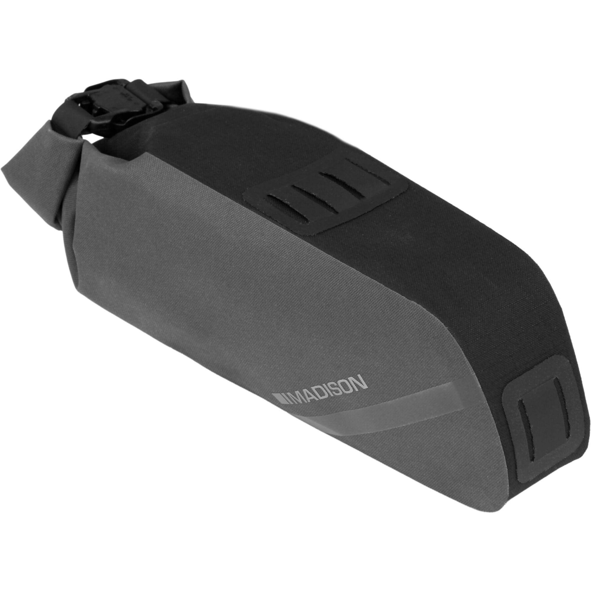 Madison Bags Roam waterproof saddle bag with elastic strap mounting system, designed for bike accessories and outdoor use.