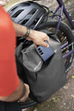 Madison Bags Roam 30L waterproof pannier bag with quick-release mounting system for cycling accessories.