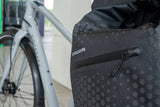 Madison Bags Roam Stellar-Tech 30L waterproof pannier bag with reflective finish, designed for cycling accessories.