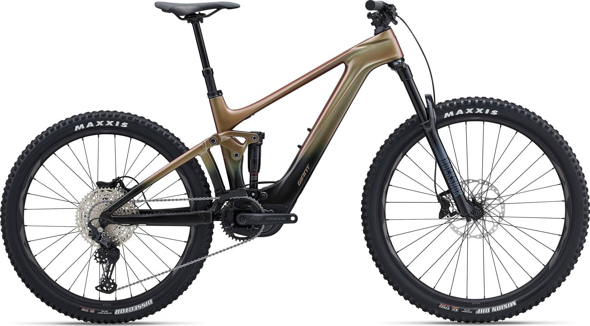 Giant Trance X Advanced E+ EL 3 e-Mountain Bike with SyncDrive Pro motor, black frame, mountain trail background