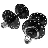Miche Primato fixed track hubs with sealed bearings, available in large and small flange options, shown in black.