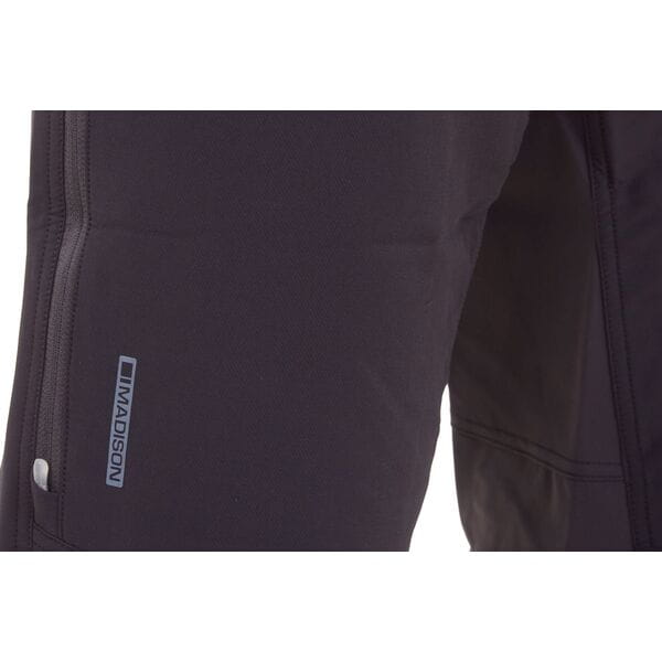 Madison Zenith men's 4-season waterproof DWR MTB trousers with ventilation, shown in a sporty outdoor setting.