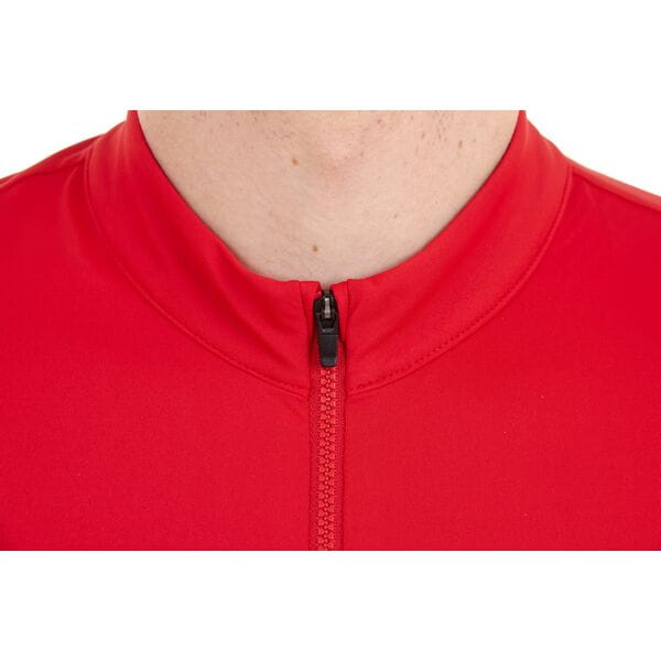 Black Madison Flux men's short sleeve cycling jersey with pockets and zipper, displayed on a hanger.