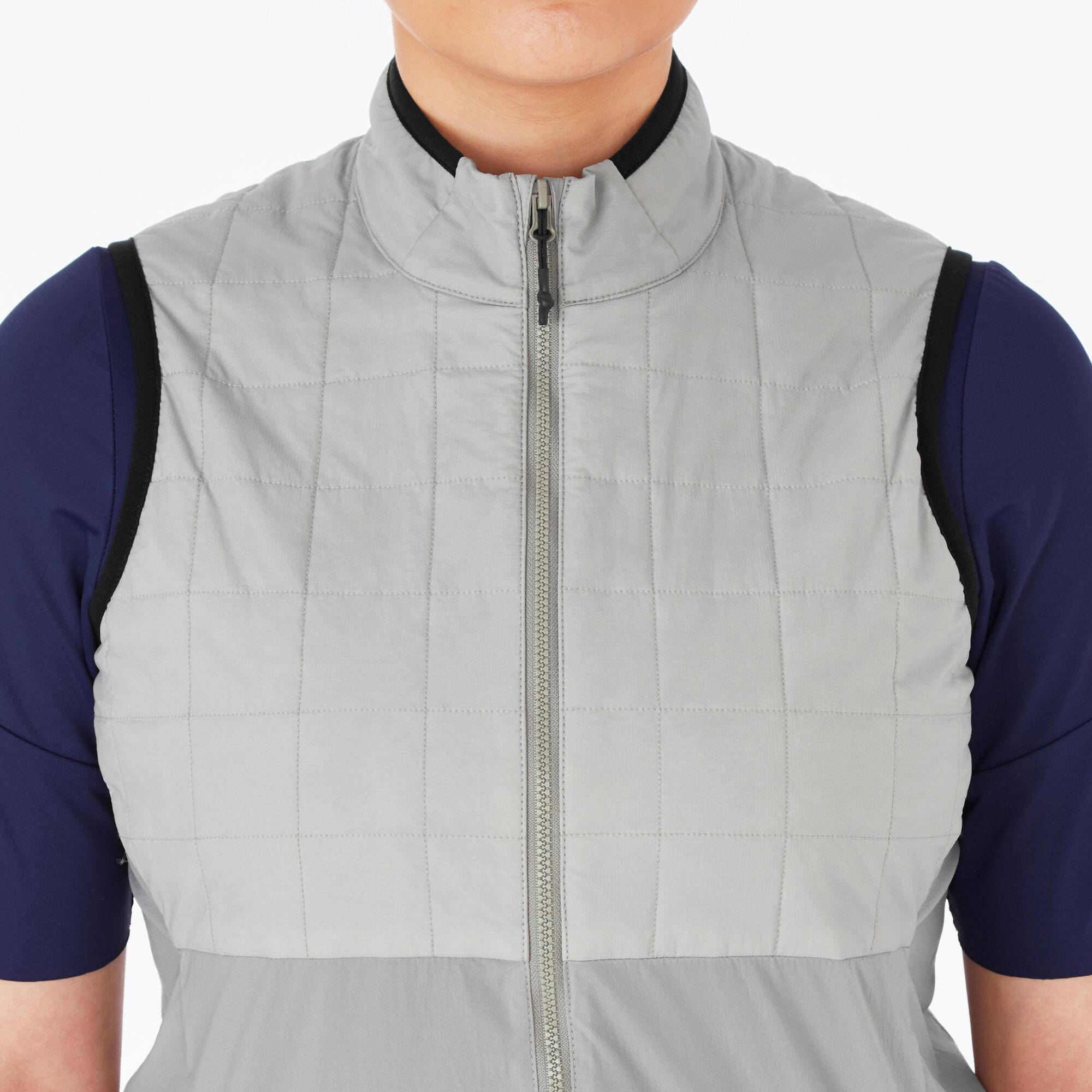 Madison Roam women's windproof packable Primaloft insulated gilet vest, shown in black, with front zipper and stand collar.