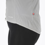 Madison Roam women's windproof packable Primaloft insulated gilet vest hanging on a rack, showcasing its lightweight design and quilting