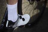 Madison Flux Performance Cycling Socks with breathable mesh and compression support, designed for comfort and performance.