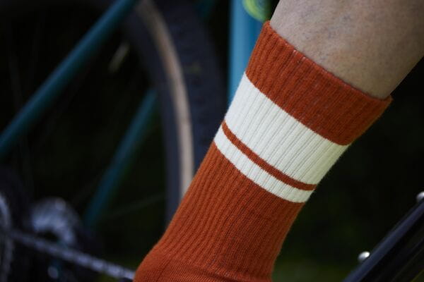 Madison Roam Isoler crew socks, thermal cycling and casual comfort socks, shown in a neutral color, designed for warmth and everyday wear.