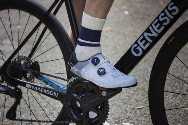 Madison Freewheel cycling socks with targeted compression and comfort features, shown in a close-up image of the socks.