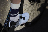 Madison Freewheel cycling socks with targeted compression, breathable fabric, and comfortable fit for active cycling enthusiasts.
