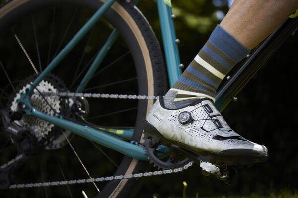 Madison Roam Isoler Merino 4 Season cycling socks with insulation and compression, shown in a close-up view.