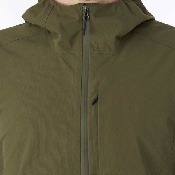 Madison Roam men's 2-layer waterproof cycling jacket with breathable fabric, shown in a close-up of the jacket's front.