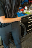 Madison Roam Workshop men's DWR cargo trousers with stretch fabric and knee pad compatibility, shown in dark color.