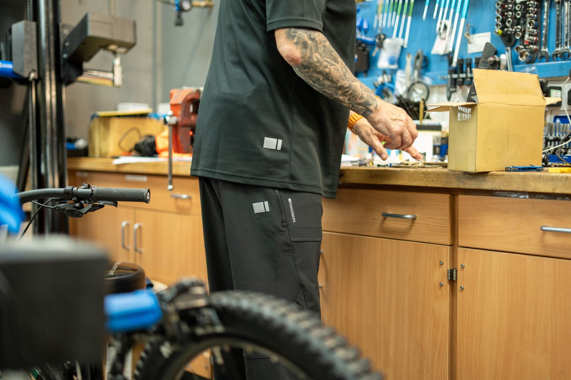 Madison Roam Workshop Isoler Polo Shirt with 1/4 zip, lightweight men's clothing for comfort and performance, shown in navy color.