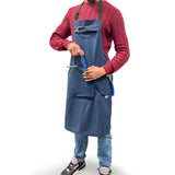 Madison Roam Blue Workshop Apron with adjustable waist and multiple tool pockets, ideal for woodworking and DIY projects.
