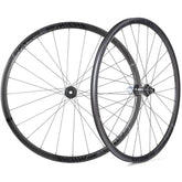 Miche Race H disc brake road wheels, tubeless-ready components for hybrid and e-bikes, featuring sleek black alloy rims and disc brake compatibility.
