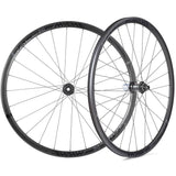 Miche Race H disc brake road wheels, tubeless-ready components for hybrid and e-bikes, featuring sleek black alloy rims and disc brake compatibility.