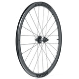 Miche Kleos RD 36mm tubeless road wheel with aerodynamic design and ceramic bearings, shown in a close-up view.