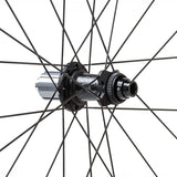 Miche SWR Evo 50 tubeless road disc brake wheels with carbon rims and aluminum 7075 hubs, mounted on a bike.