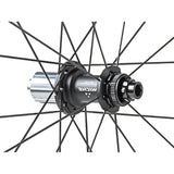 Miche Syntium Aero Road Wheels, asymmetric 29mm tubeless-ready wheelset, black carbon rims with spokes and hub components.