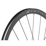 Miche Syntium Aero road wheelset with asymmetric 29mm tubeless-ready rims, featuring sleek black carbon components.