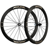 Miche Graff Aero 48 disc gravel wheels with tubeless-ready tires and 35-60mm width, designed for versatile gravel riding.