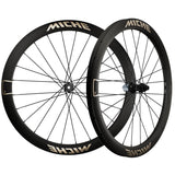 Miche Graff Aero 48 Disc Gravel wheels with tubeless-ready 35-60mm tires, featuring aerodynamic design and black alloy rims.