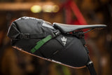 Miss Grape Adventure Waterproof Seatpack Saddle Bag for cycling, 13L capacity, black with adjustable straps, designed for bike accessories.