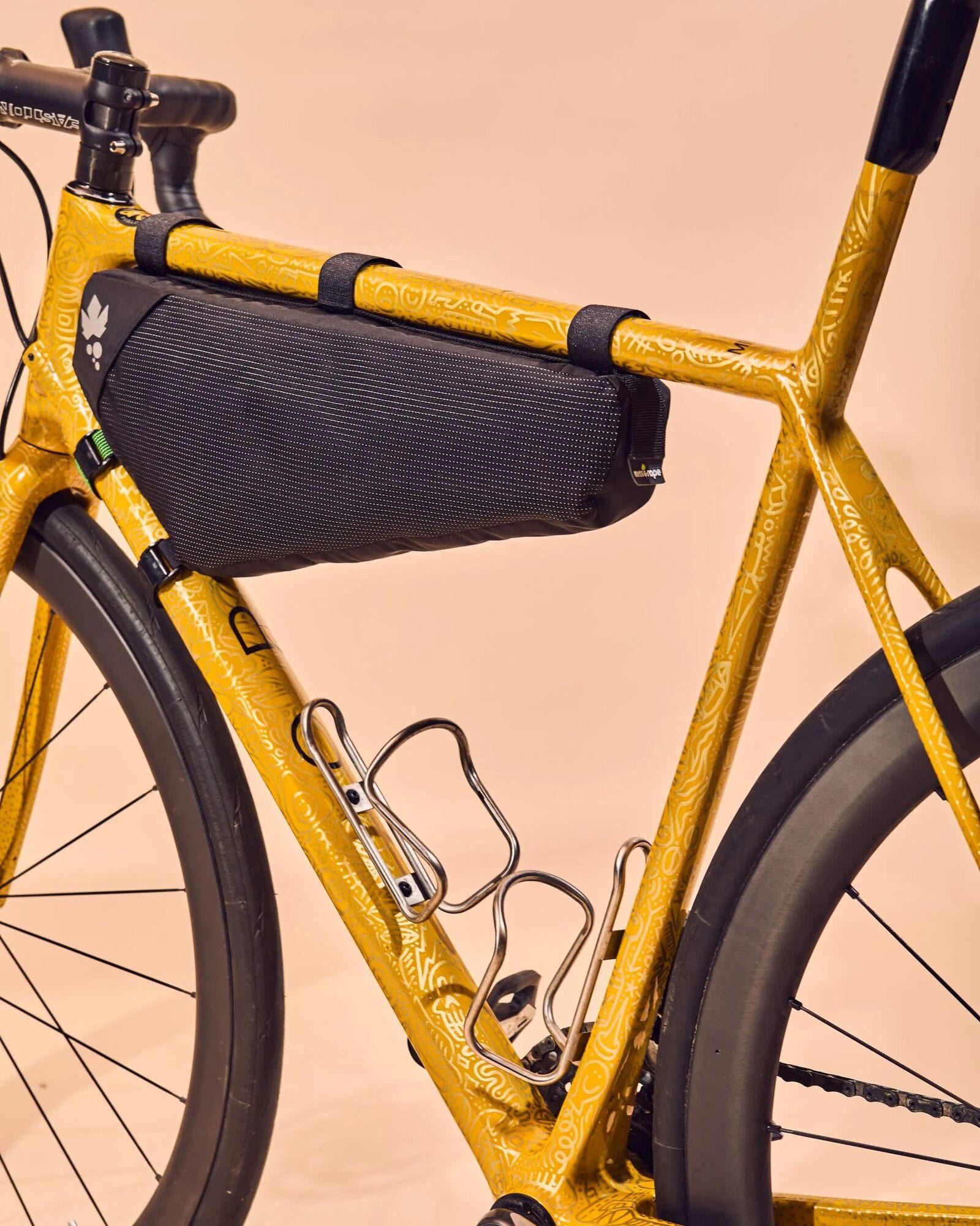 Miss Grape Internode 3 Road waterproof frame bag attached to a cycling bike, designed for gravel and cycling adventures.