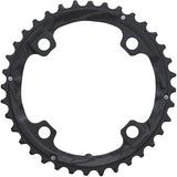 Shimano Deore XT FC-T781 36T black triple chainring for 10-speed mountain bike components, shown in close-up view.