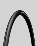 Michelin Dynamic Sport wire bead tire for road cycling, showing the durable rubber tread and sidewall design.