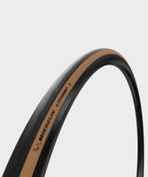 Michelin Lithion 4 road bike tyre showing tread pattern and sidewall design, designed for durability and high grip on various terrains.
