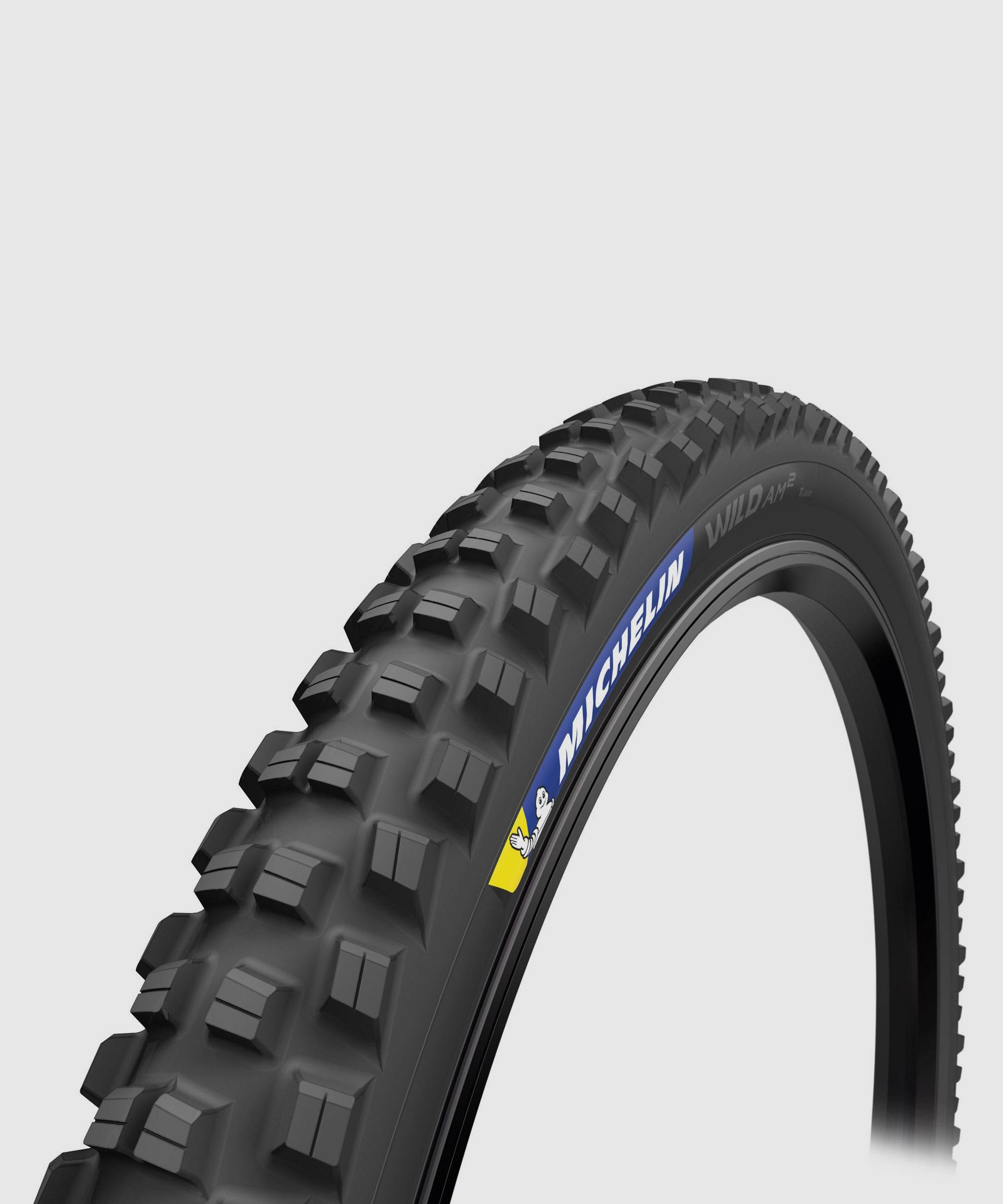 Michelin Wild AM² tubeless-ready all-mountain mountain bike tire with GUM-X technology, shown mounted on a wheel.