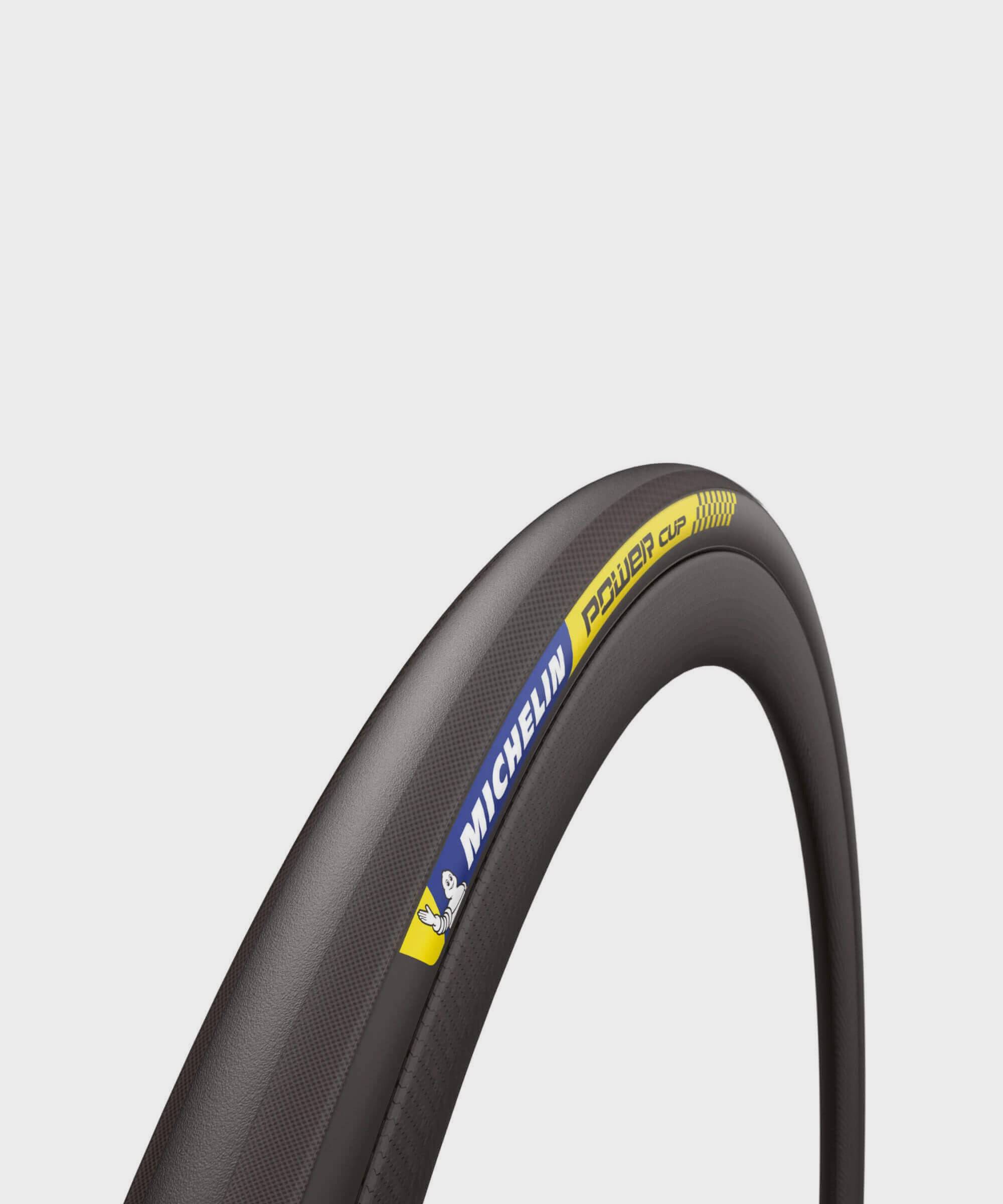 Michelin Power Cup tubular tire for high-performance road racing bikes, showing close-up of tread and sidewall details.