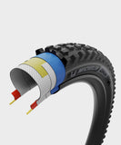 Michelin DH22 Racing Line downhill tubeless-ready mountain bike tire mounted on 27.5-inch wheel.