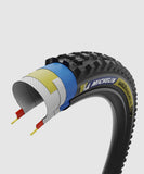 Michelin Wild Enduro MS Racing Line tubeless-ready mountain bike tire with aggressive tread for enduro riding.