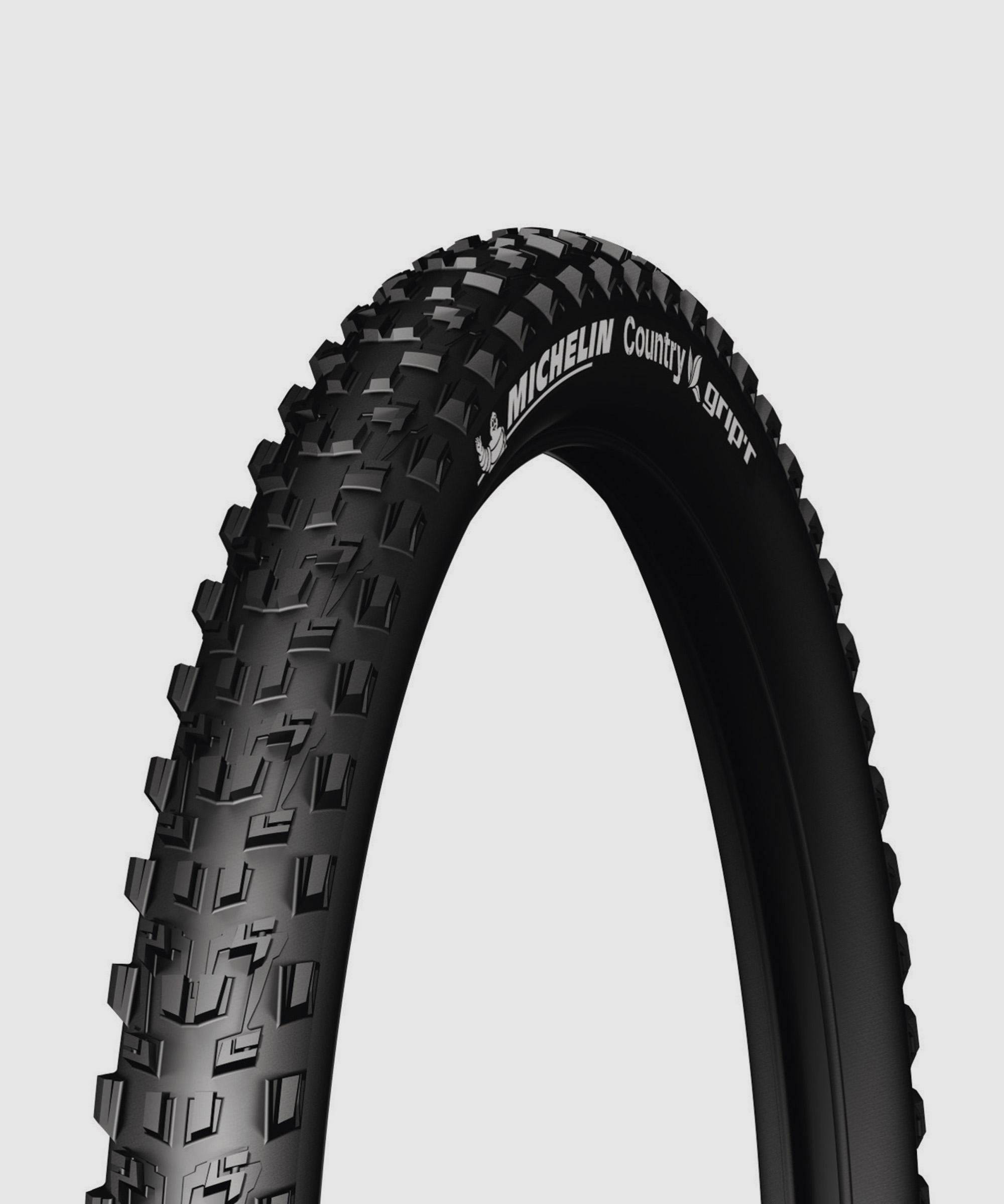 Michelin Country Grip'R mountain bike tyre for cross-country and mixed terrain with rugged tread pattern, designed for durability and traction.