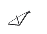 Trek X-Caliber mountain bike frameset with internal cable routing and rear rack mounts, designed for off-road cycling.
