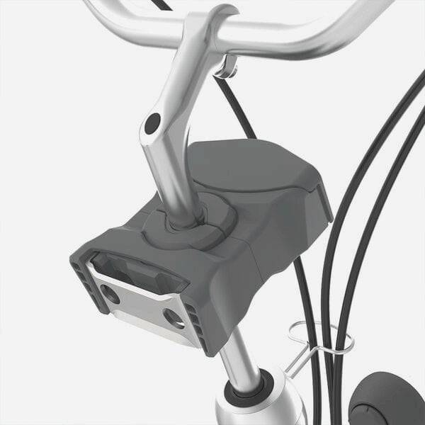 Urban Iki TA-KE front child bike seat showing weather-resistant design and secure mounting on a bicycle.