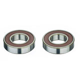 Mavic kit bearings 18x30x7 with waved washer and clip hub spares for wheel repair, showing components laid out clearly.