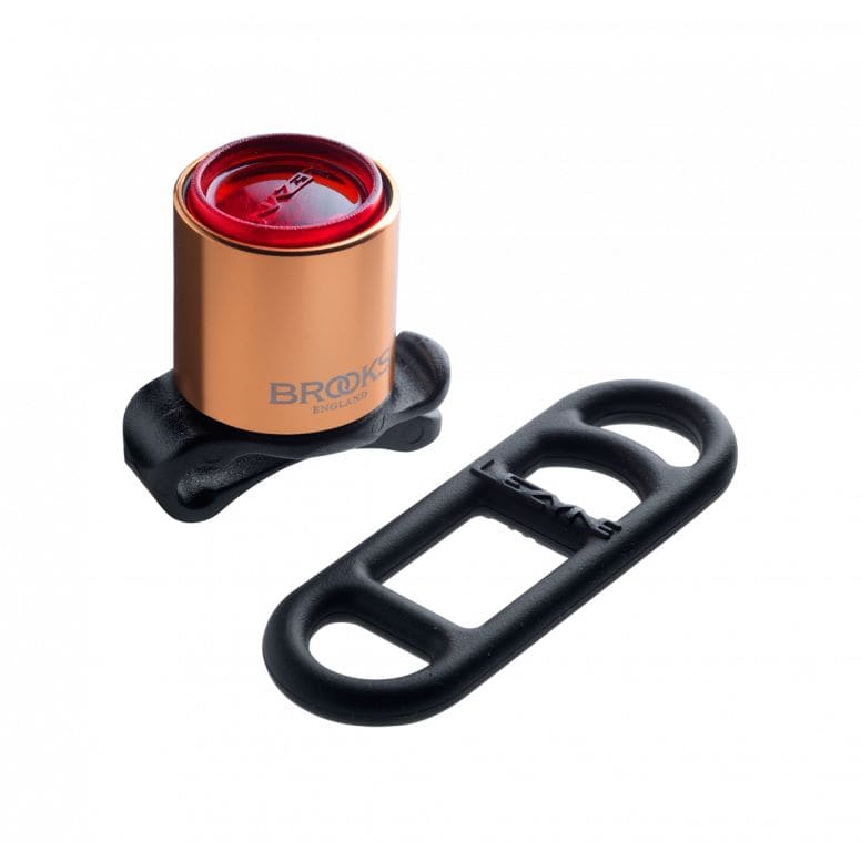 Brooks FEMTO Copper rear bike light with 15 lumens and multiple flash modes, compact cycling accessory for visibility.
