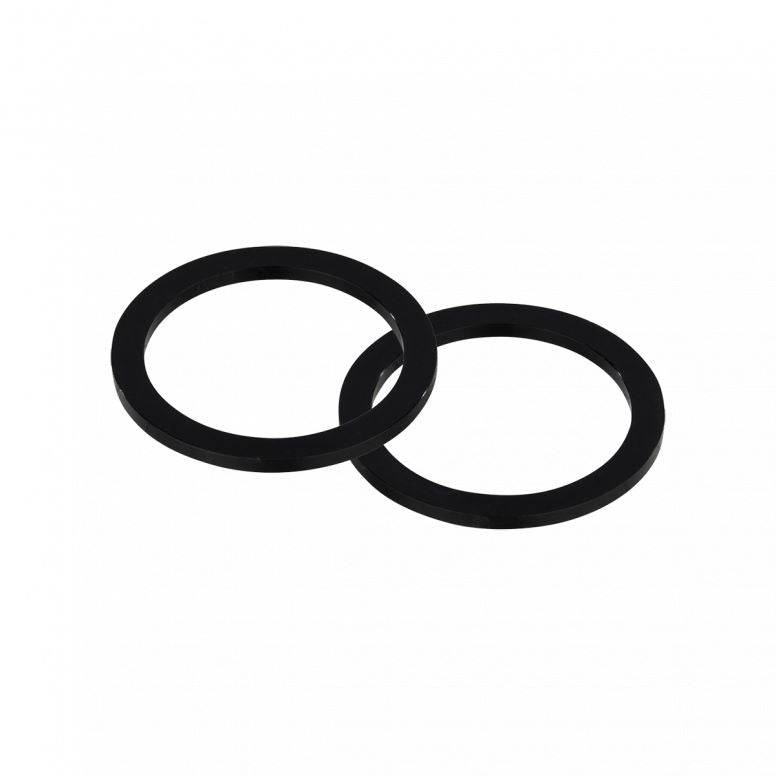 Cane Creek Hellbender 2.5mm BSA bottom bracket spacer kit in black for bicycle components, shown in the image.