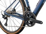 Liv Devote Advanced 2 MY26 women's gravel bike with lightweight frame, knobby tires, and drop handlebars for versatile riding.