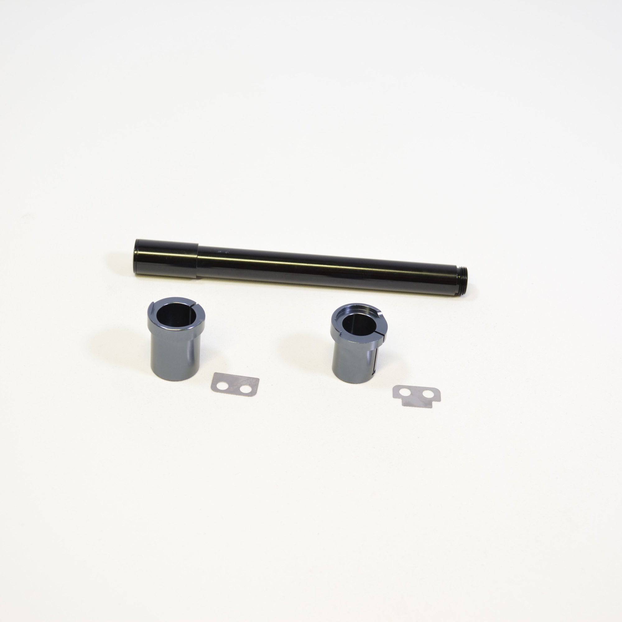 Fox Fork 36 2015 15mm axle conversion kit components, including spacers and accessories for mountain bike suspension forks.